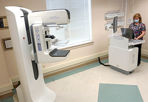 Radiology technologist Mary Pantoja prepares 3D mammography services for patients at Bon Secours Community Hospital.